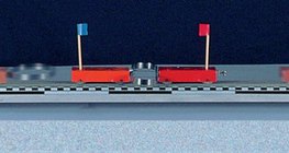 دفع سيارتين متساويتين الكتلة بعيداً عن بعضهما بواسطة نابض