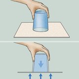 لماذا لا يسيل الماء من الكأس المقلوب نحو الأسفل؟