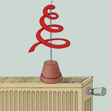 أفعى ورق موضوعة على جهاز التدفئة