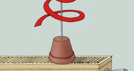 أفعى ورق موضوعة على جهاز التدفئة