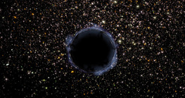 تجمع نجمي كروي مع وجود ثقب أسود بداخله (تم إضافته رقمياً إلى الصورة)